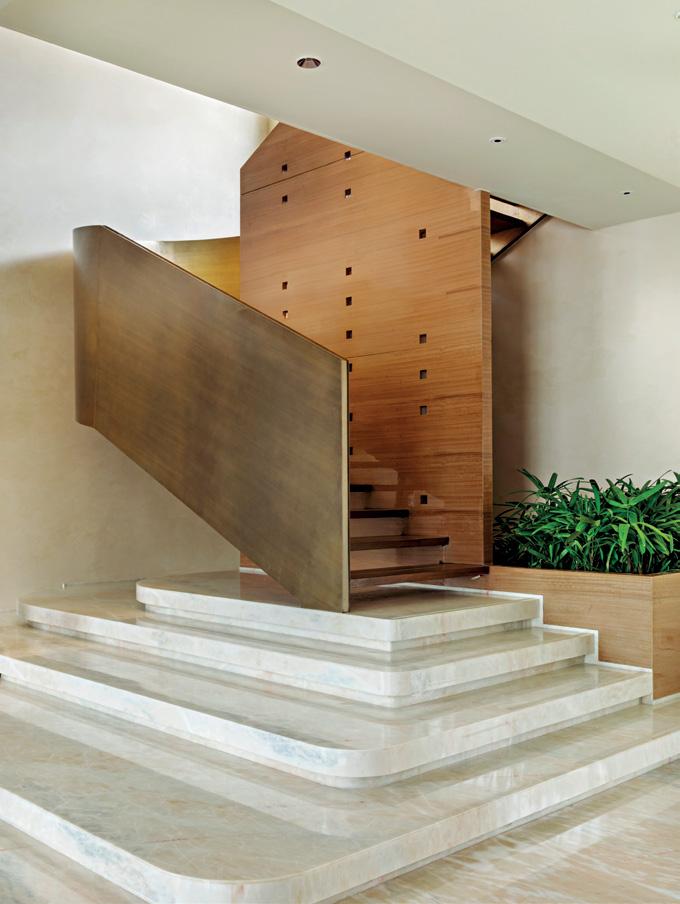 A PENTHOUSE SCULPTED IN BRASS, STONE & LIGHT