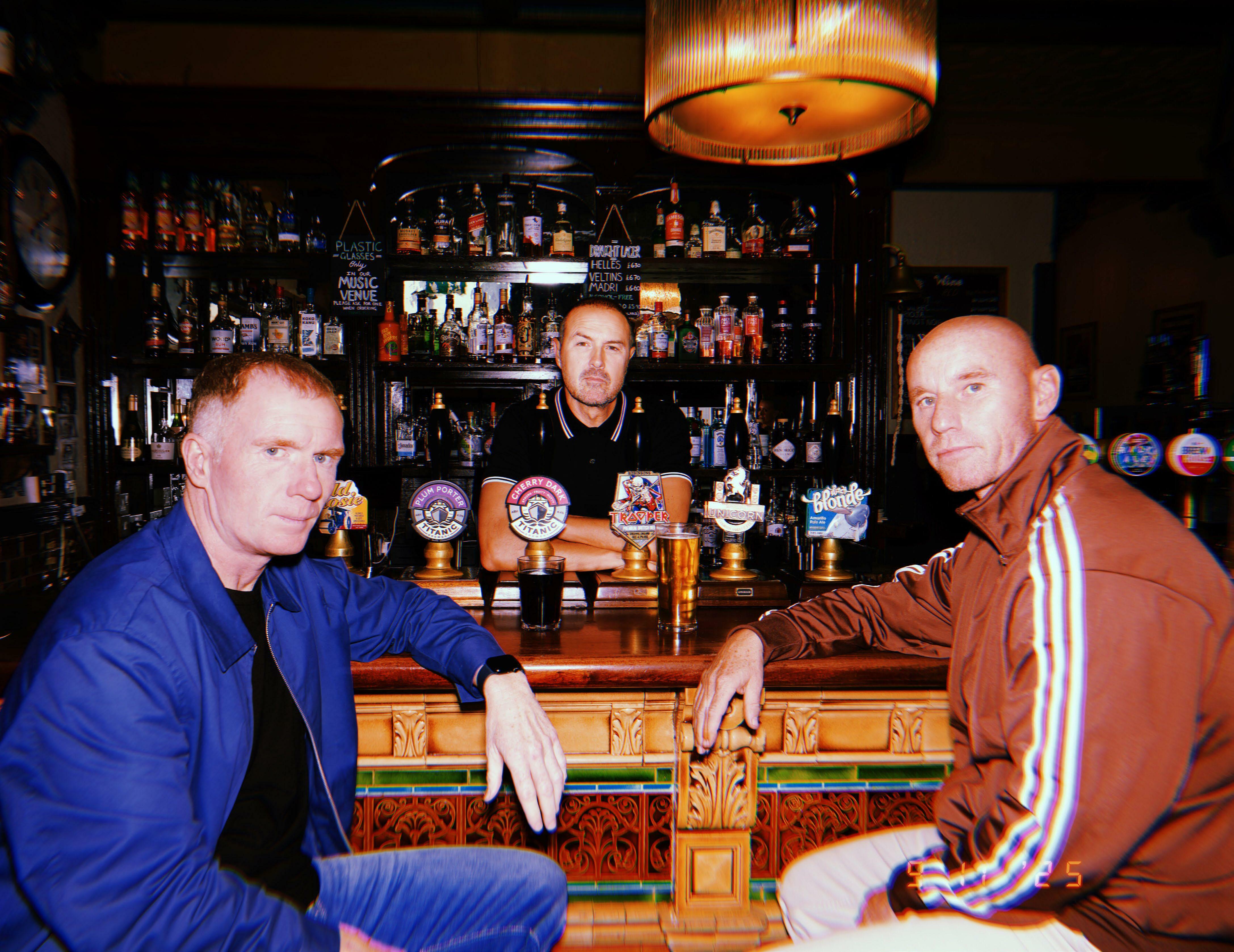 TWO FOOTBALLERS AND A COMEDIAN WALK INTO A BAR...