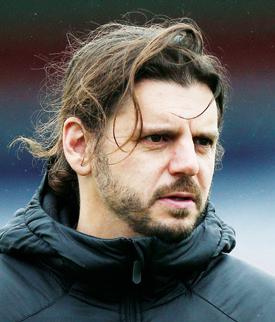HARTLEY CHIEF IS FINALLY SNARED BY DAY