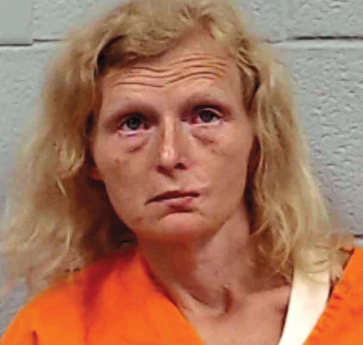 MOM CHARGED AS DEMON DENTIST
