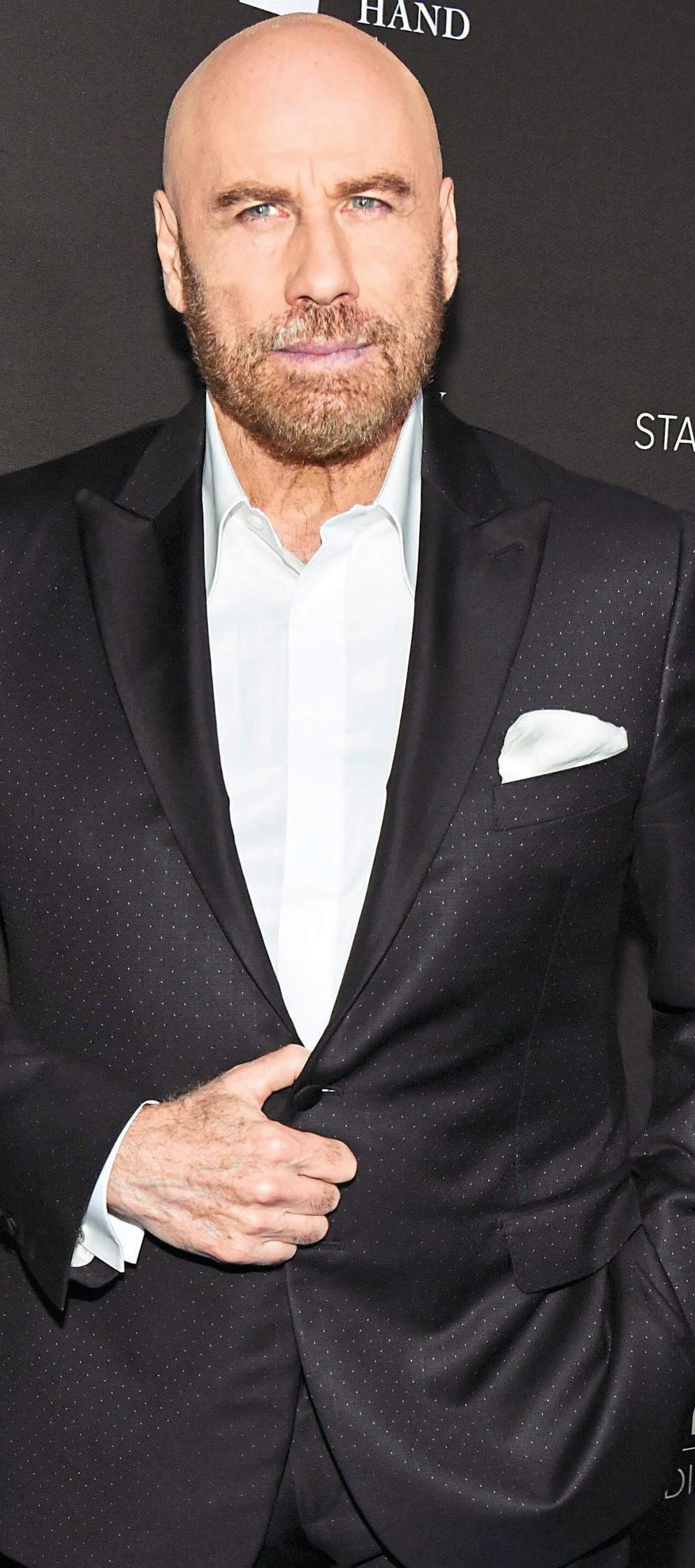 TRAVOLTA SNUBS SUSSEXES