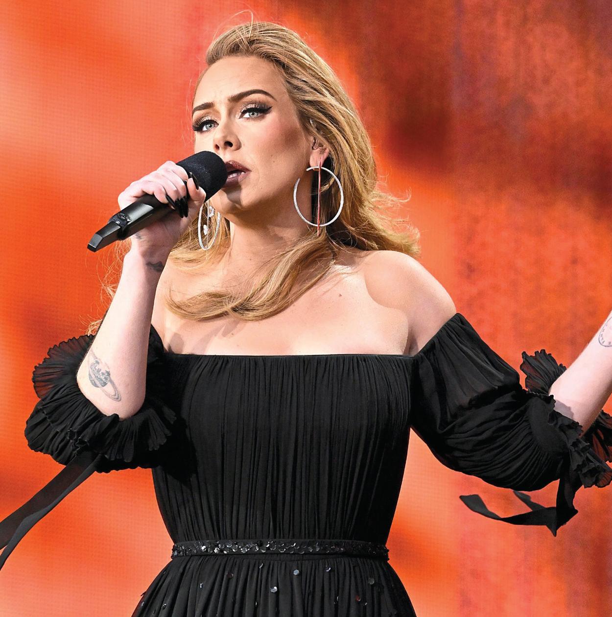 ADELE PIPES DOWN FOR BABY