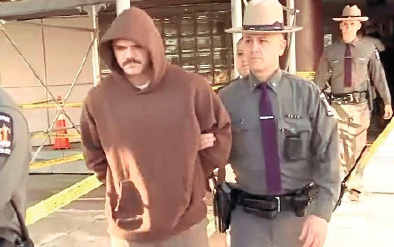 COP CAGED FOR SHOOTING HIMSELF