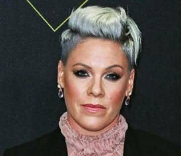 Bold and Beautiful: Singer Pink's Iconic Pixie Cut - See the Amazing