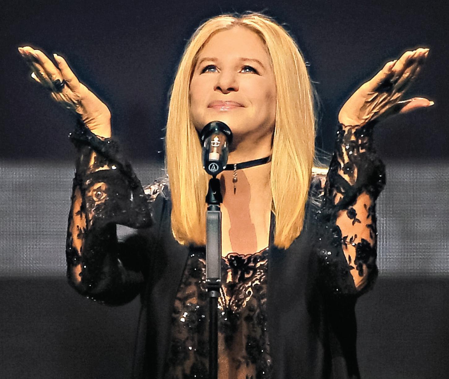 FAIR-WEATHER FANS RAIN ON BARBRA'S PARADE