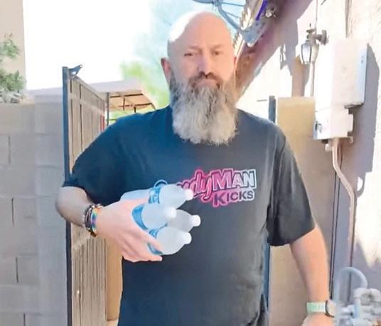TOWN SAYS DO-GOODER IS ALL WET!
