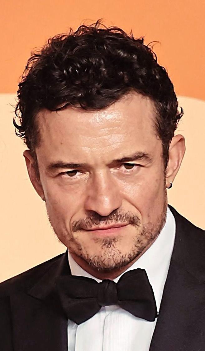 ORLANDO'S EX PLAYS UMP WITH KATY