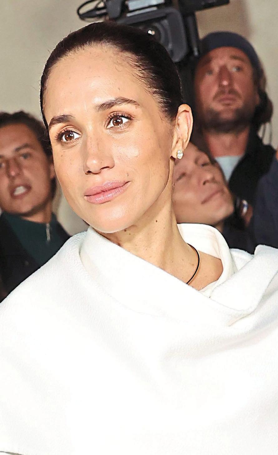 MEGHAN MAKIN' MOVES ION VOGUE'S WINTOUR