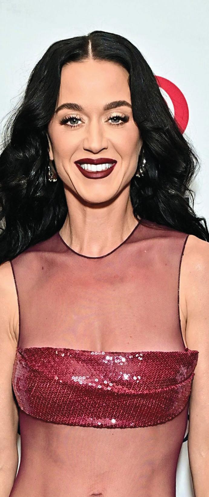 KATY ROARS BACK THANKS TO JUSTIN