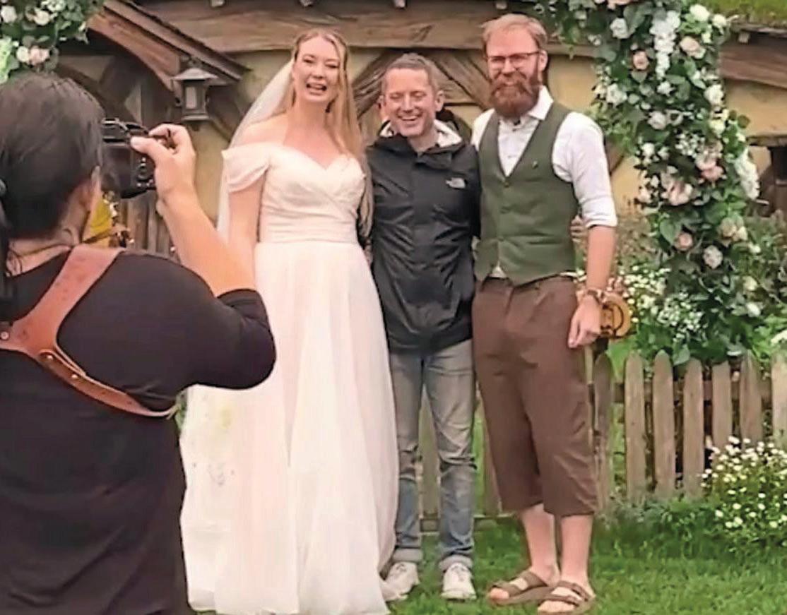 WEDDING'S A REAL 'RINGS' CEREMONY