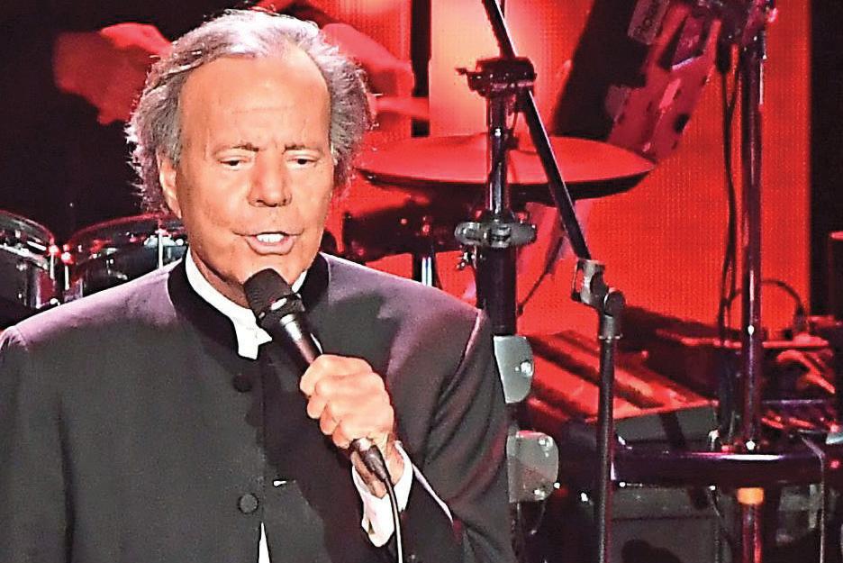 JULIO BEGS FOR SON'S RISE