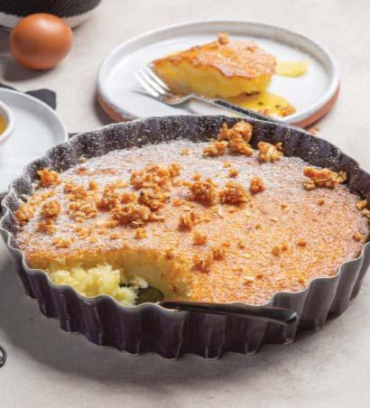 Baked coconut pudding with passion fruit sauce