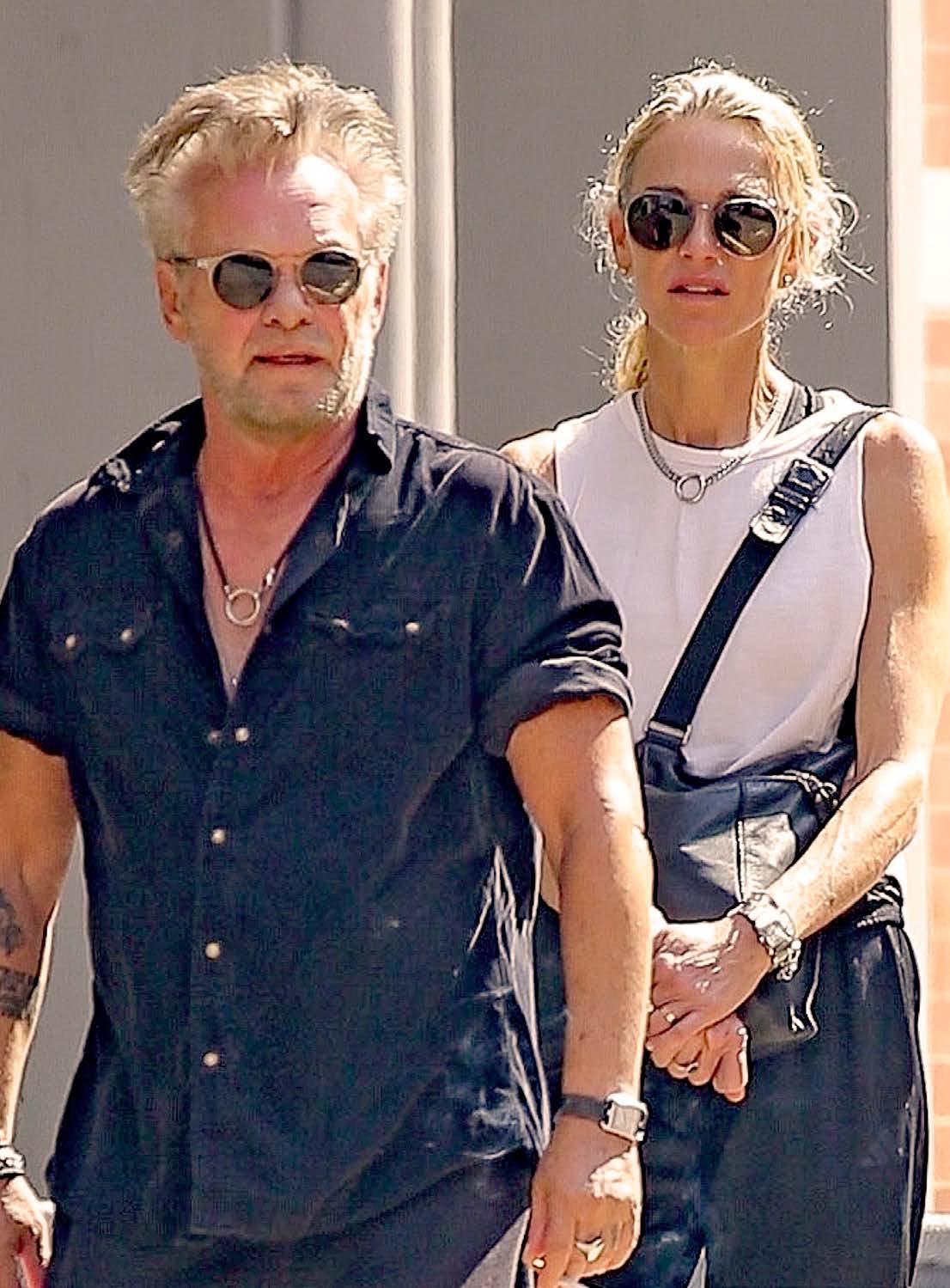 JOHN MELLENCAMP STILL HUNG UP ON MEG