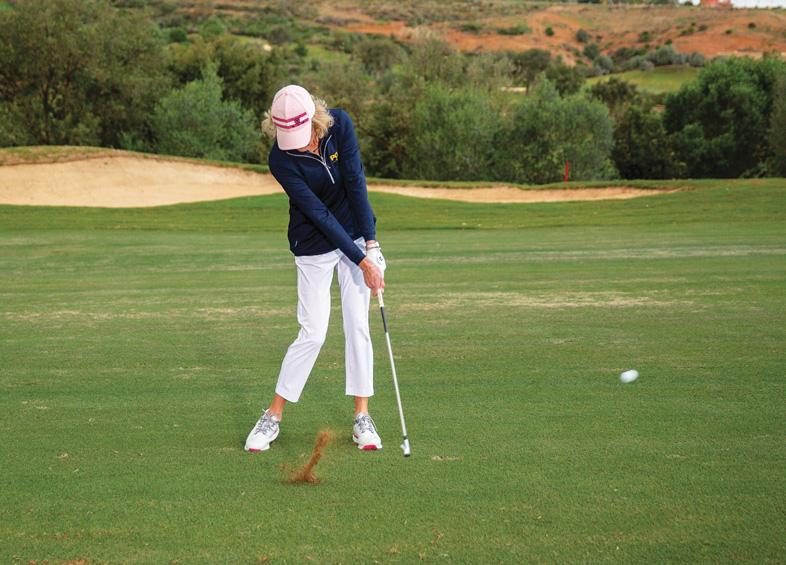 Should I try to keep my head down when hitting irons?