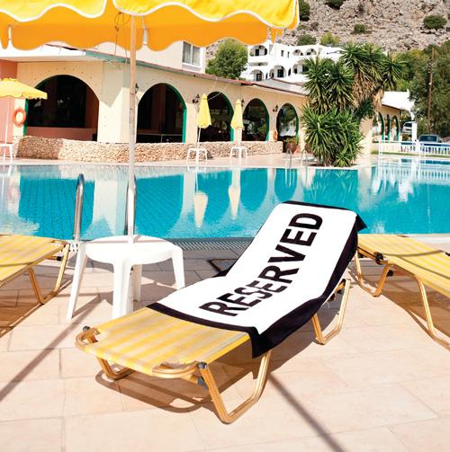 TOWELS AND SUNBEDS AT DAWN