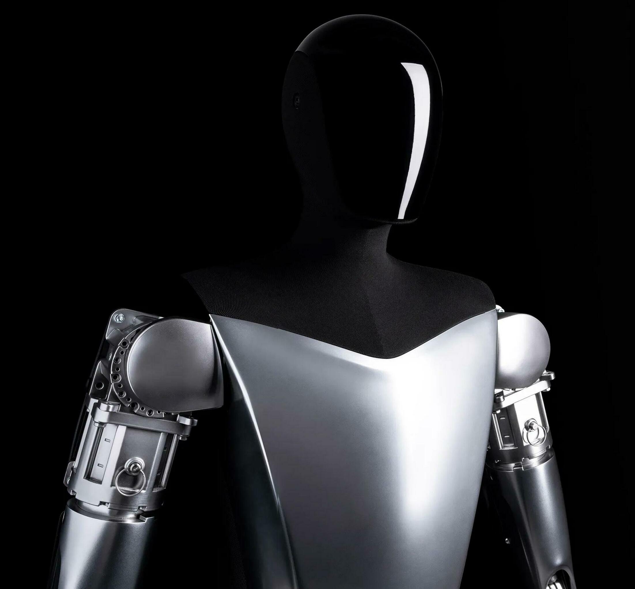 ELON MUSK TEASES NEW TESLA OPTIMUS CAPABILITIES IN “ROBOCOP”-LIKE DEMO