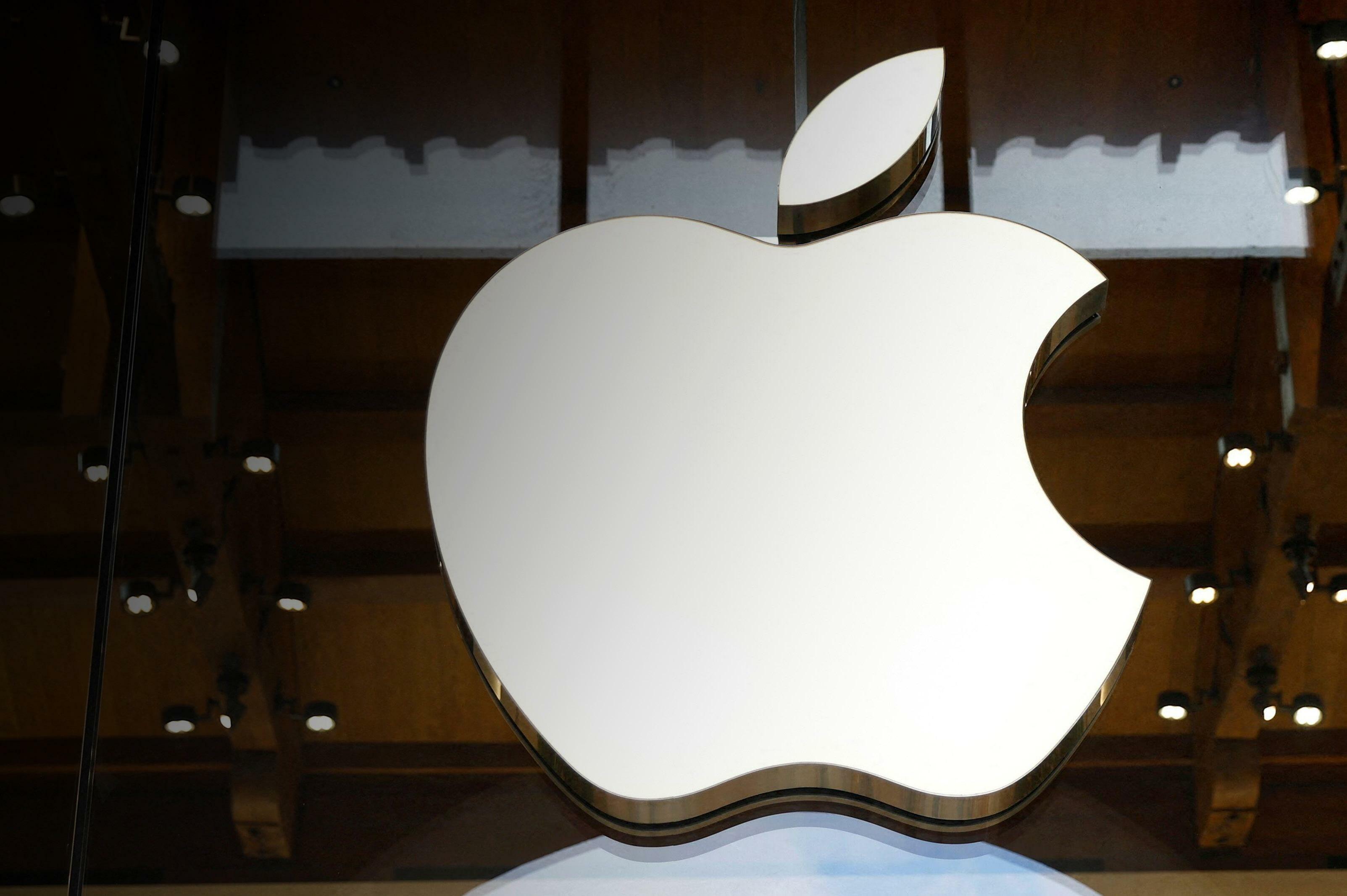 APPLE MAKES RARE JOB CUTS AS SALES TEAMS FACE RESTRUCTURING