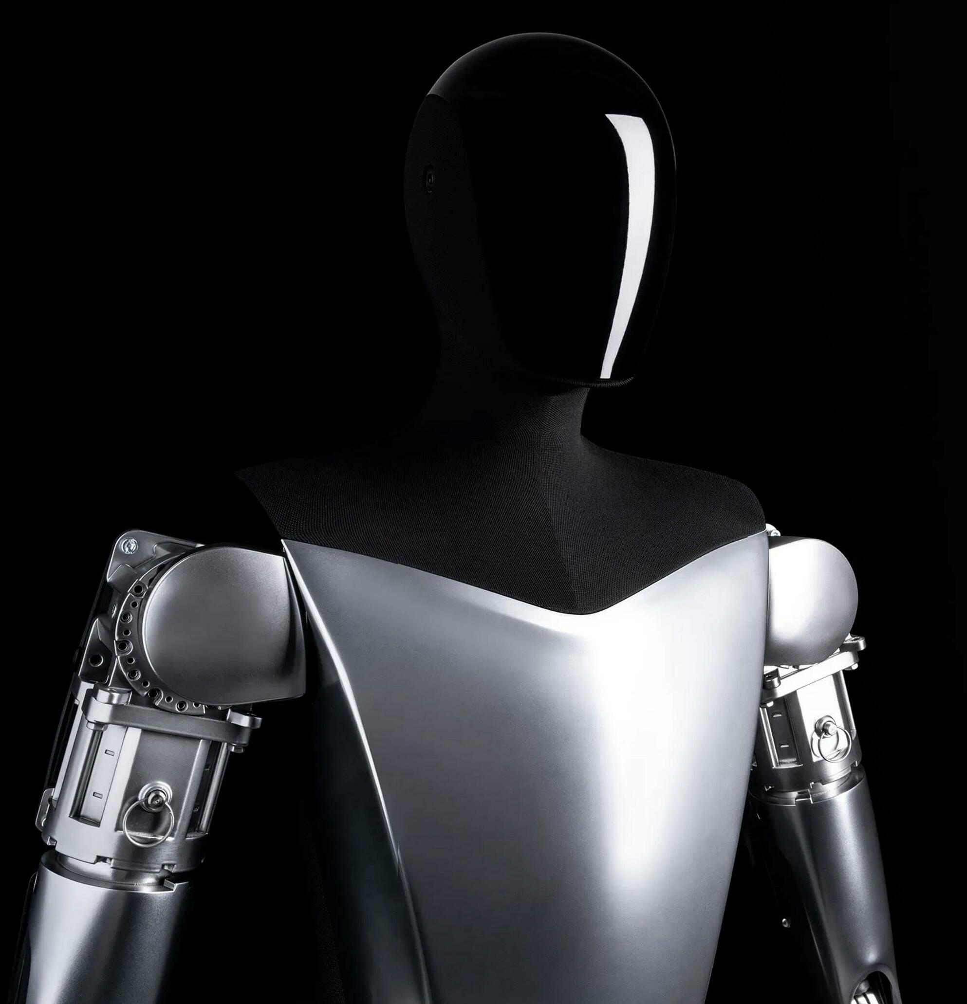 ELON MUSK TEASES NEW TESLA OPTIMUS CAPABILITIES IN “ROBOCOP”-LIKE DEMO