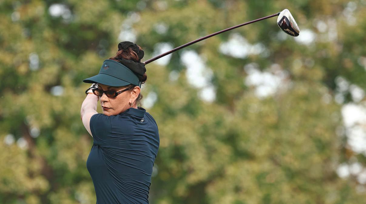 CATHERINE GETS INTO THE SWING OF THINGS
