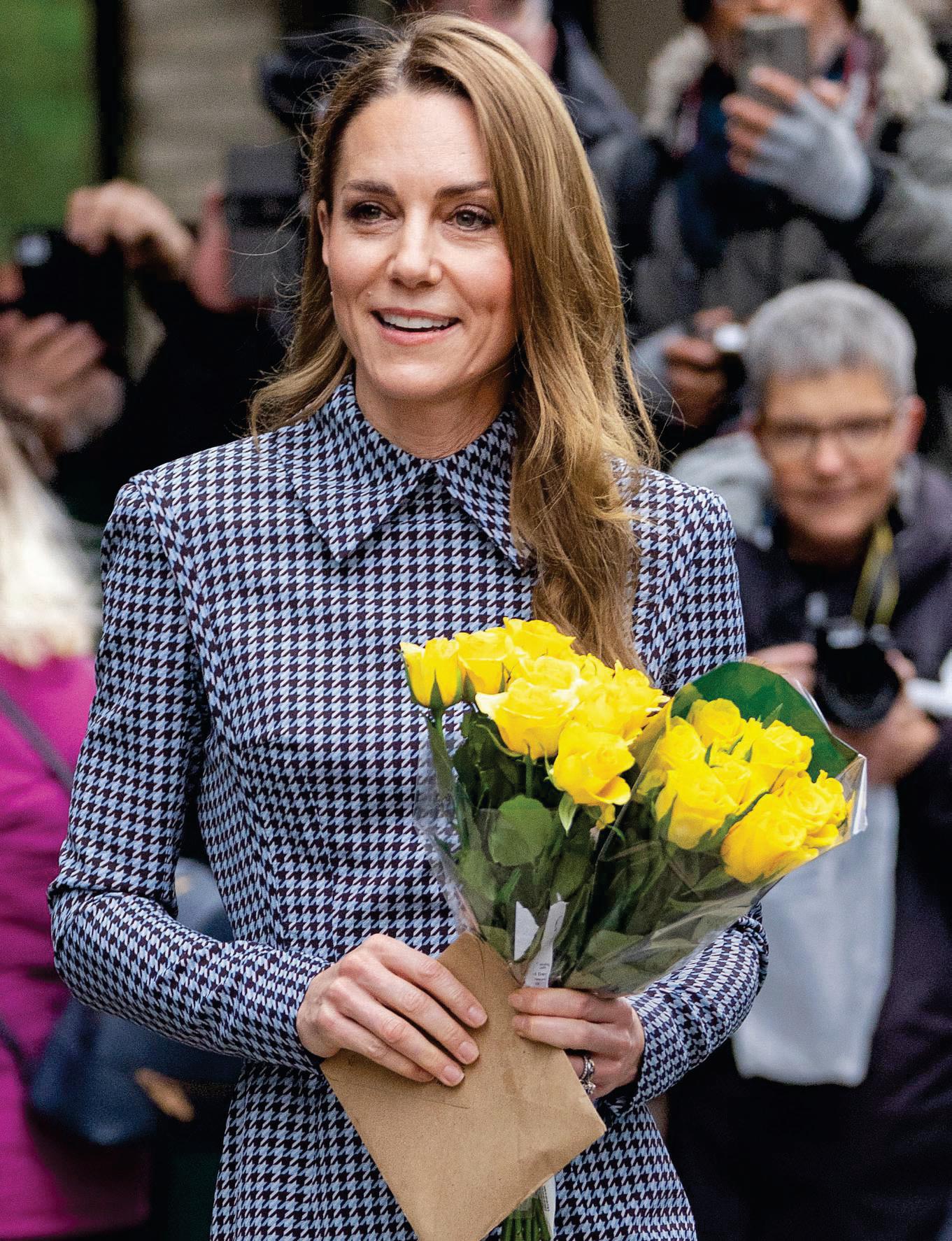 KATE LENDS A HAND