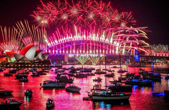 AROUND THE WORLD IN FIREWORKS THE UNIVERSAL MAGIC OF NEW YEAR'S MIDNIGHT