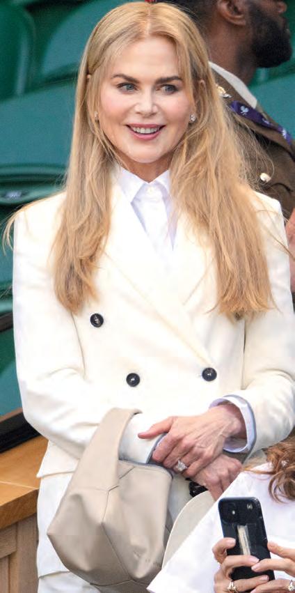 NICOLE LIVING IN LONDON... without Keith!