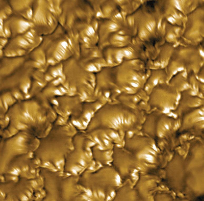 ULTRA-FINE MAGNETIC 'CURTAINS' ON THE SUN REVEALED