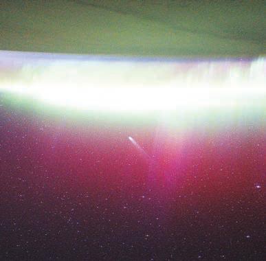 ASTRONAUTS SEE COMET LEMMON 'ABSORBED' BY AURORAE