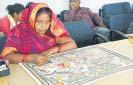 FM wears a sari gifted by Madhubani artist
