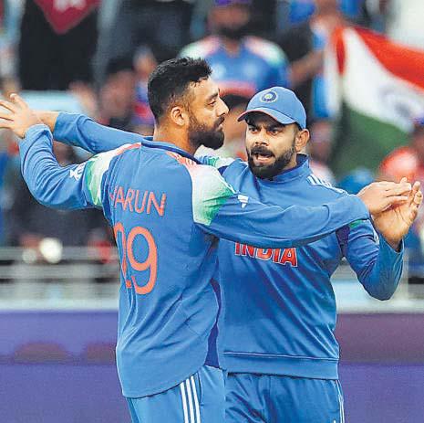 Varun, Shreyas help India set up semis date with Australia