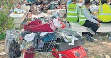 Kin Await Return of Personal Effects Now Part of Analysis