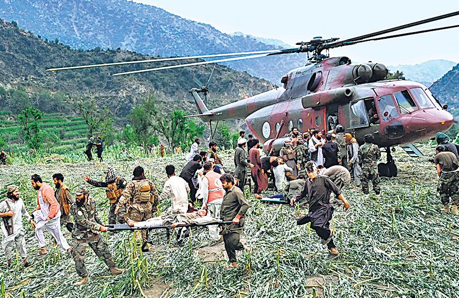Race to find survivors as quake toll tops 1,400
