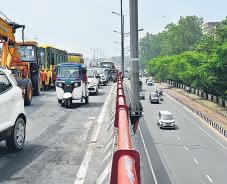 Bizman dies after falling off flyover in car collision