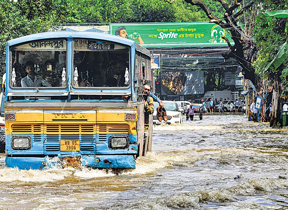 Day after deluge, Kolkata struggles to stay afloat
