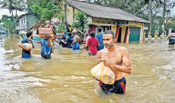 Race to provide aid as Asia floods toll 1,350+