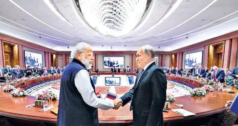 Seeking balance, India, Russia agree to deepen economic ties