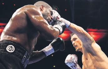 Usyk becomes two-time undisputed heavyweight champ after Dubois KO