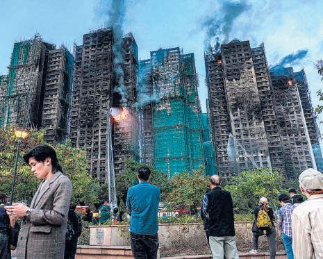 Death toll in HK blaze soars to 83, with 300 still missing