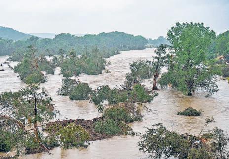 24 dead in Texas floods; 2 dozen girls missing