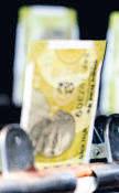 Rupee dips 20 paise to settle at record low of 92.45 vs dollar
