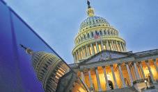 Gold hits record, dollar drops as US govt shutdown looms