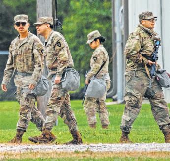 In showdown, Trump calls for jailing Dem mayor, governor