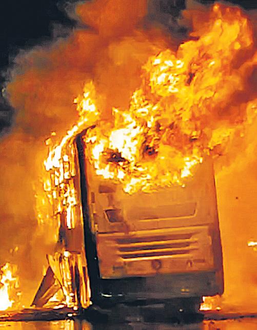 20 killed as bus bursts into flames after bike collision