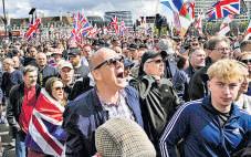 British govt defends refugee shakeup in face of hard right