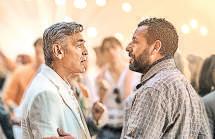 Clooney and Sandler shine in this glossy but hollow drama