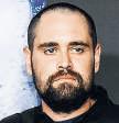 Son charged with Rob, wife’s murder