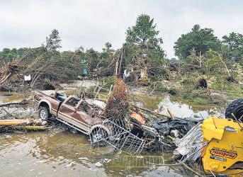 Hopes fade for missing Texas flood victims as death toll mounts to 100