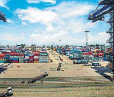 June trade deficit narrows to 4-month low of $18 bn