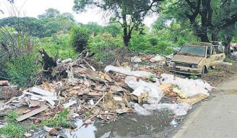 { 10-FOOT-HIGH WALL PLANNED } MOVE FOLLOWS ILLEGAL USE OF THE PLOT Army to fence vacant defence land in Camp