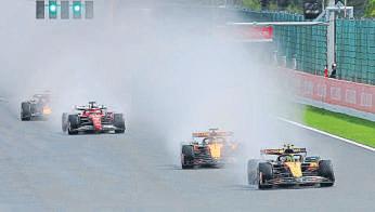 Piastri holds off Norris in rain-hit Belgian Grand Prix to extend lead